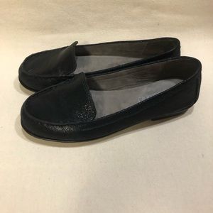 Textured black leather flats